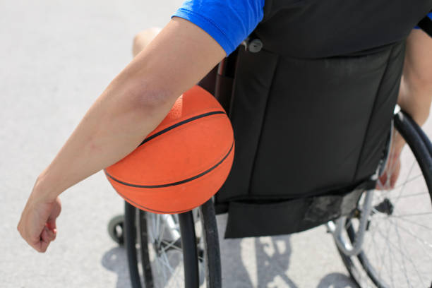 istock Disabled basketball player on wheelchair 1157198738