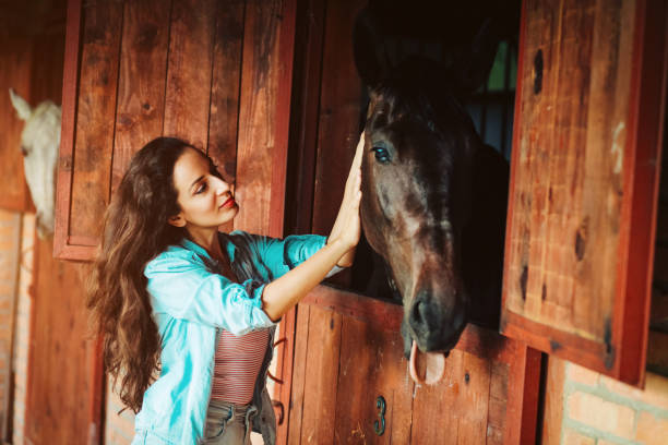 istock Woman with horse 1157199053