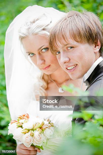 Bride And Groom In Nature Stock Photo - Download Image Now - Adult, Adults Only, Arm Around