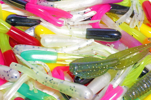 Numerous rubber and silicon fishing lures without hooks