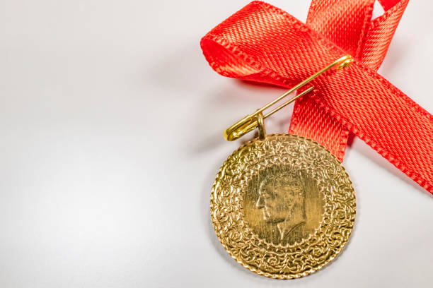 istock close up half Turkish gold lira on the white background 1157203300
