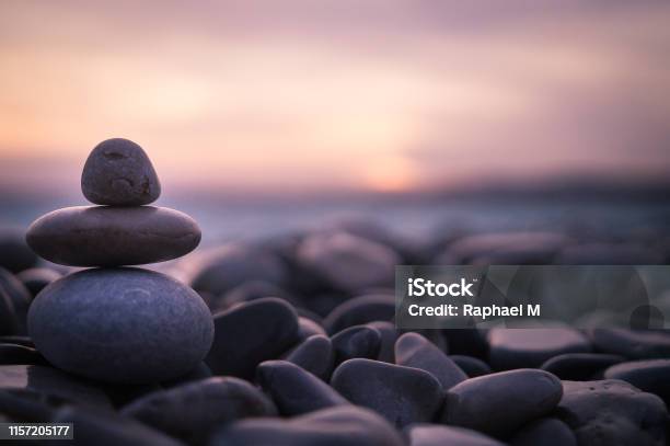 Sunset With Pebbles On Beach In Nice France Stock Photo - Download Image Now - Tranquility, Nature, Zen-like
