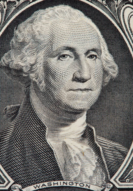istock Close up of one us dollar bill isolate on white background. 1157214421