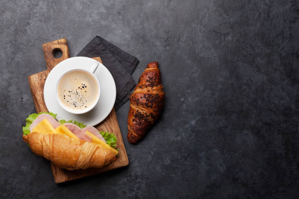 istock Coffee and croissant sandwich 1157216266