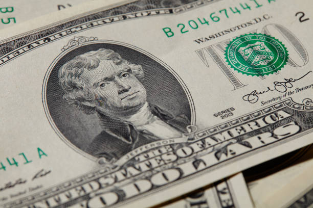 istock American two dollars, a background 1157218380