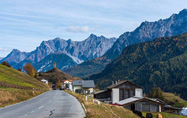 the village of ardez, graubunden in switzerland - castle engadine alps lake water imagens e fotografias de stock