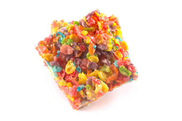 istock Fruity Cereal Marshmallow Treat Bars Isolated on a White Background 1157220227