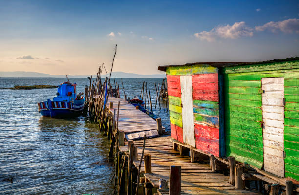 Shed and Small Boats at Porto Palafitico, Carrasqueira, Portugal Shed and small boats at Porto Palafitico, Carrasqueira, Portugal troia stock pictures, royalty-free photos & images