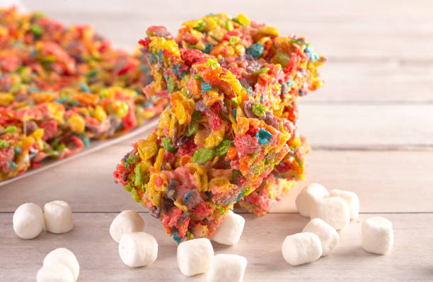 istock Fruity Cereal Marshmallow Treat Bars on a Light Wood Table 1157223212