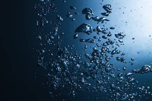 istock air bubbles in water stylish blue background 115722579