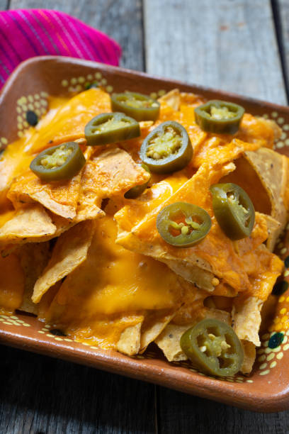 istock Mexican nachos with real cheese and jalapenos pepper 1157227597