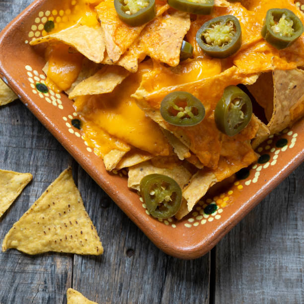 istock Mexican nachos with real cheese and jalapenos pepper 1157229720