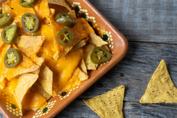 istock Mexican nachos with real cheese and jalapenos pepper 1157230998