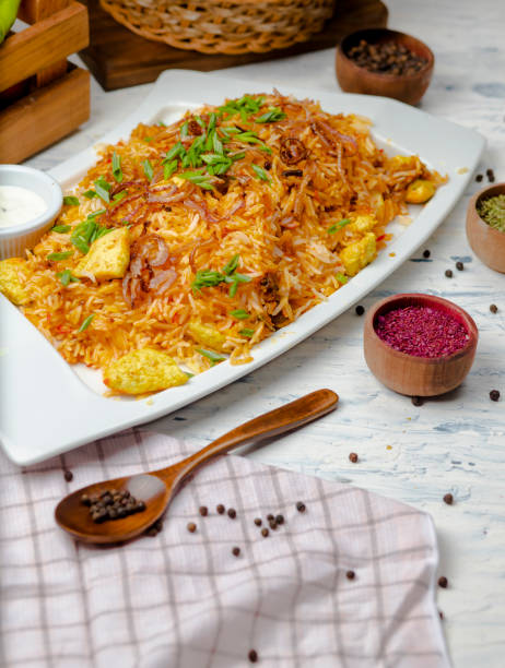 istock Chicken breast, tomato sauce rice, risotto, plov with herbs. 1157231392