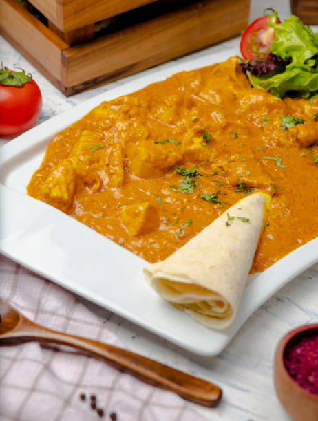 istock Indian curry with chicken breast and tomato sauce. 1157233297