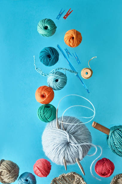 istock Various wool yarn and knitting needles, creative knitting hobby background 1157233500