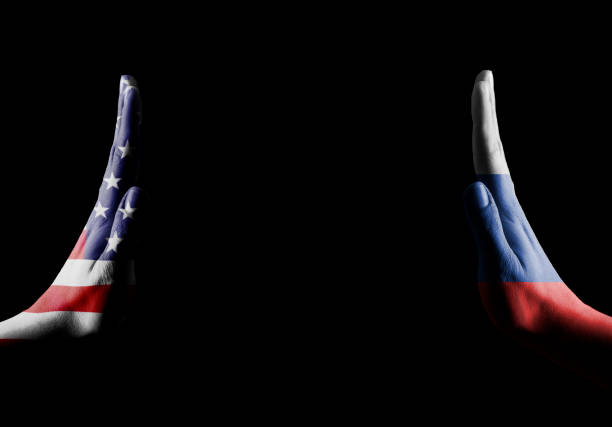 istock Two hands with USA and RUSSIA flag showing stop gesture - Empty space for text / Flag concept (Click for more) 1157234274