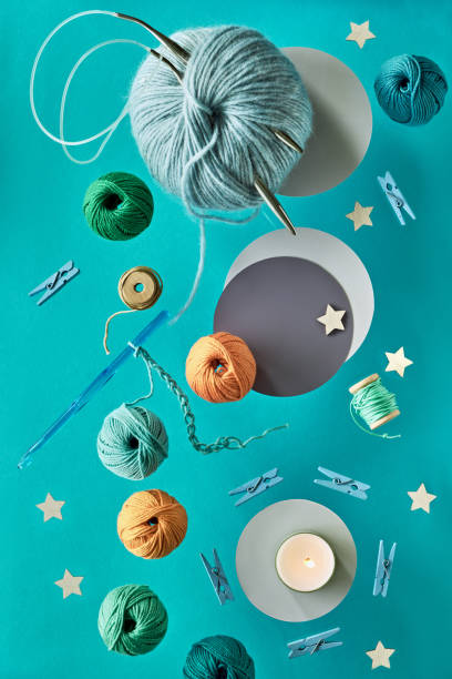 istock Various wool yarn and knitting needles, creative knitting hobby background 1157235041