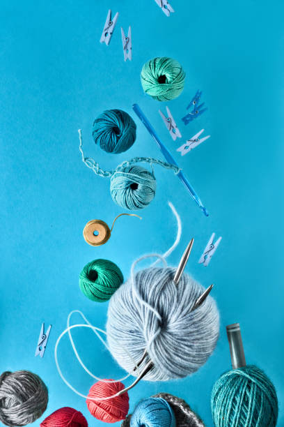 istock Various wool yarn and knitting needles, creative knitting hobby background 1157235305