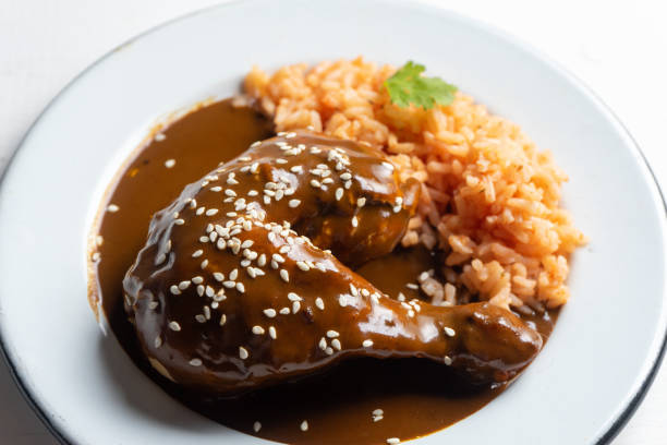 istock Mexican chicken with mole sauce and red rice 1157235995