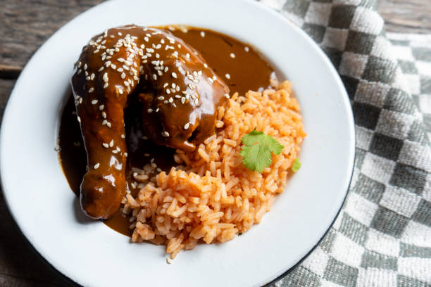 istock Mexican chicken with mole sauce and red rice 1157236083