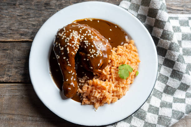 istock Mexican chicken with mole sauce and red rice 1157236805