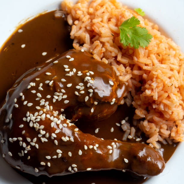 istock Mexican chicken with mole sauce and red rice 1157236862