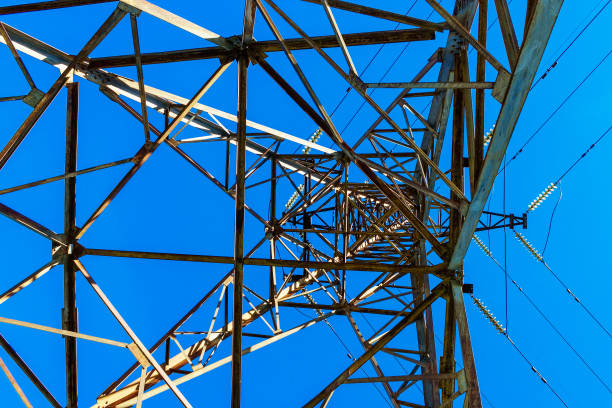 istock the power transmission tower against the blue sky 1157237032