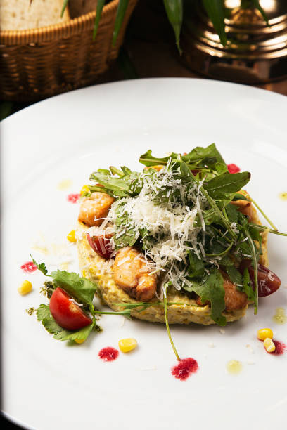 istock Caesar salad with fresh vegetable and chicken. 1157239119