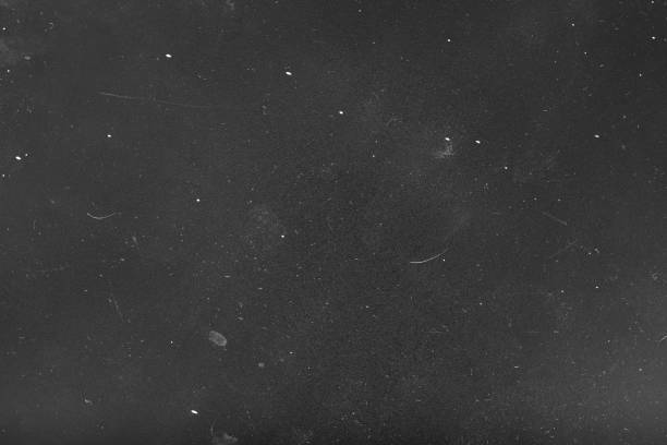 istock grainy overlay gray background dust scratches 1157244316