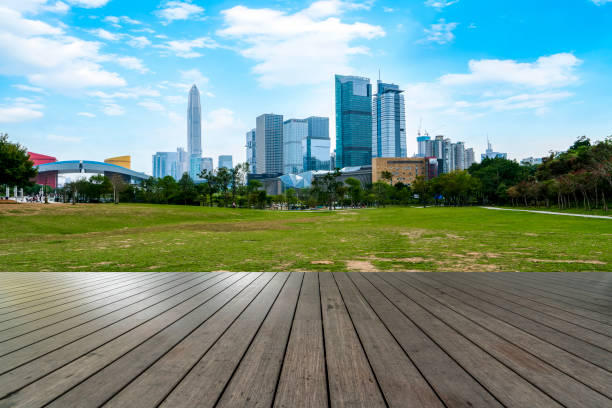 istock Empty square tiles and skyline of urban Architecture 1157245591