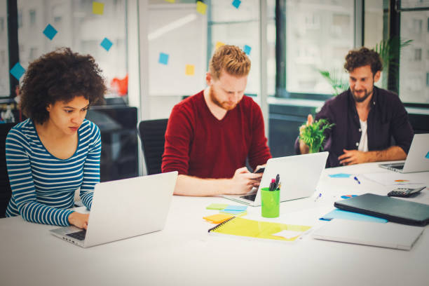 istock Business people working in modern office space 1157245873