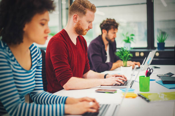 istock Business people working in modern office space 1157245875