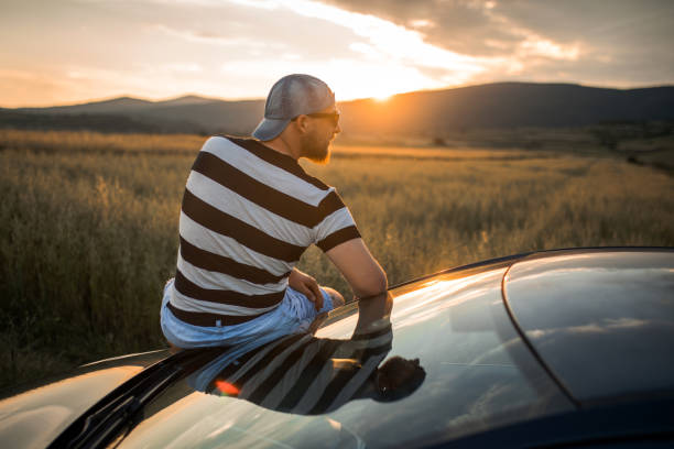 istock Taking a break on a road trip to enjoy the sunset 1157246551