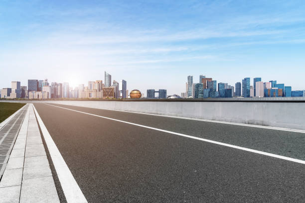 istock Road and skyline of urban architecture 1157248874