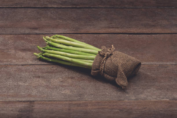 istock Fresh Asparagus in Sack bag 1157251768