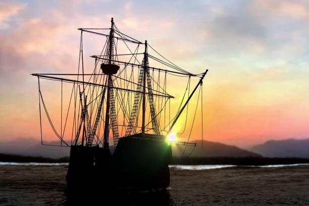 istock Pirate ship at the open sea during  sunset 1157254772
