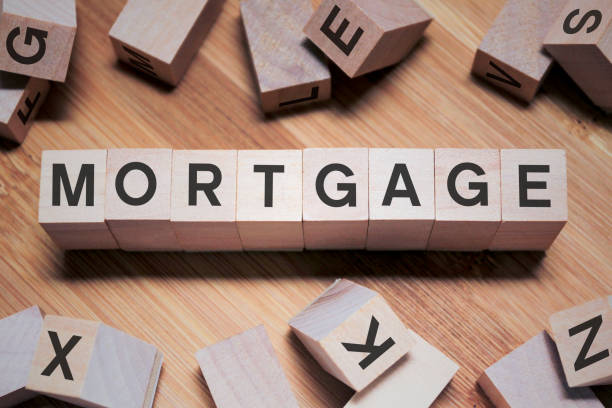 Mortgage Word In Wooden Cube stock photo