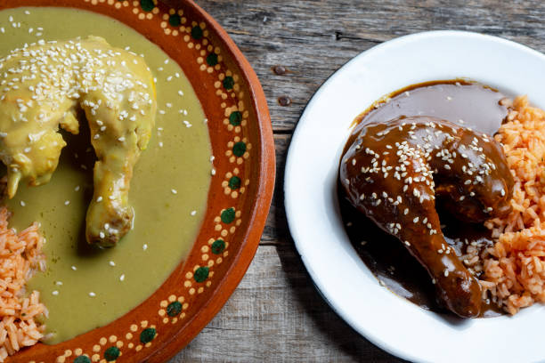 istock Mexican chicken with green and red mole sauce and red rice 1157262661