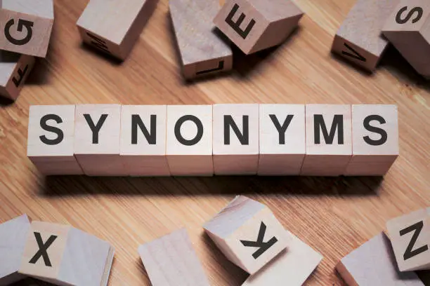 Photo of Synonyms Word In Wooden Cube