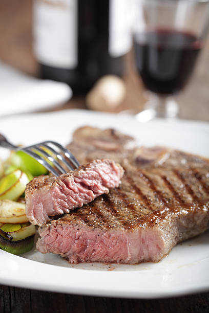 istock Medium rare steak on the plate 115726586