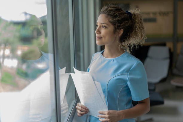 istock Thoughtful nurse working at the hospital 1157266698