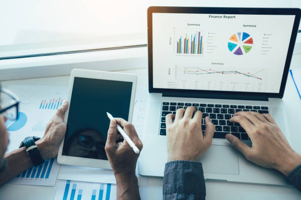 istock Two entrepreneur person working and colleague analyzing data for new start-up business and marketing. 1157266840