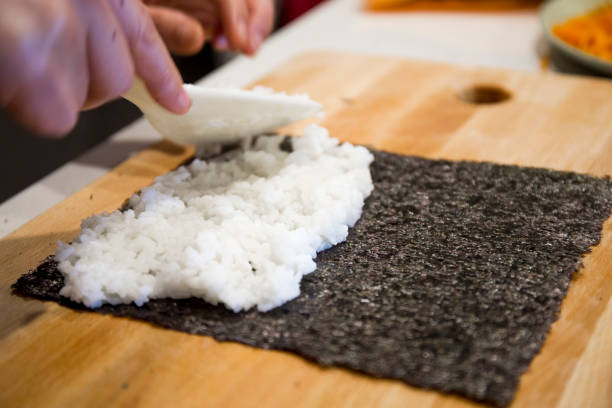 istock Making kimbab on the seaweed 1157267618