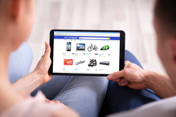 istock Couple Shopping Online On Tablet 1157269363