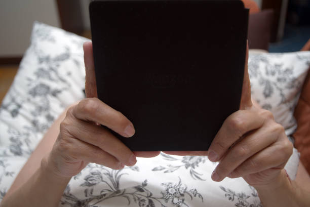 istock Woman reading a tablet 1157270338