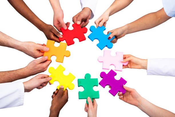 istock High Angle View Of Medical Team Solving Jigsaw Puzzle 1157270490