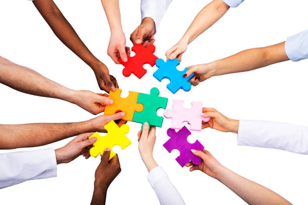 istock High Angle View Of Medical Team Solving Jigsaw Puzzle 1157270502
