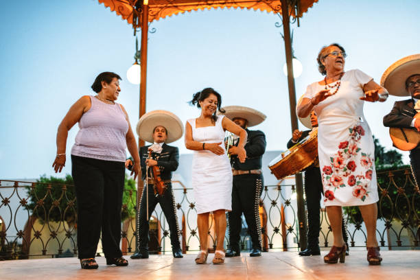 Senior Group Reunion Celebration in Mexico Mexican Senior Group Reunion Celebration with Mariachi band concert family reunion celebration stock pictures, royalty-free photos & images