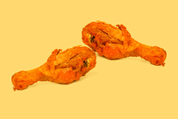 istock Fire  chicken leg on color background. 1157271772